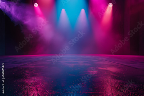 Dancing floor with colorful lights on dark background, empty stage for product presentation, concert or party. Abstract night club studio room.