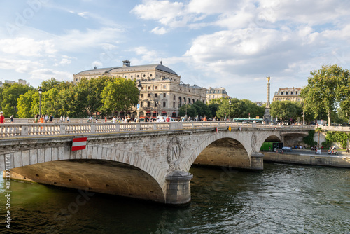 Traditional French architecture buildings and bridge along the Seine River promenade, boat ride. Paris, France.