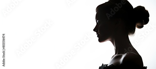 Silhouette of a woman in a black dress