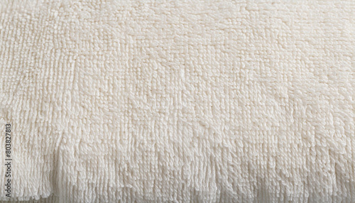 white fabric and texture concept - close up of a towel terry cloth