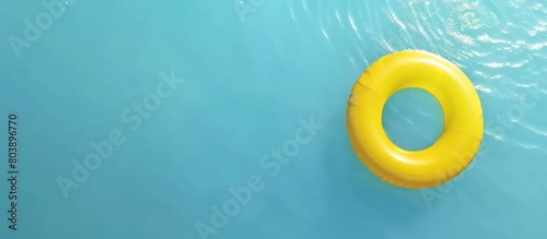 Yellow ring buoys in swimming pools in summer