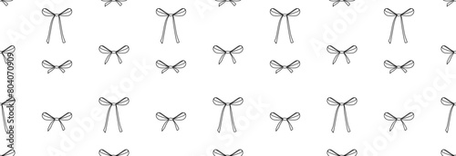 Many different bows on a white background. Seamless pattern.
