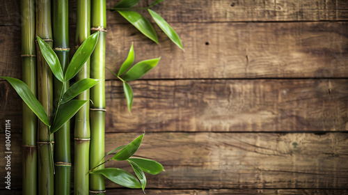 Bamboo stems on wooden background closeup