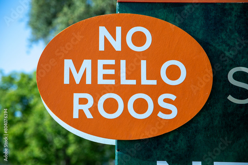 A round sign stating No Mello Roos .at a new home development