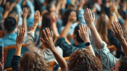Raised hands and arms of large group of people in class room, audience voting in professional education surrounding, selective focus with anonymous people. Generative AI
