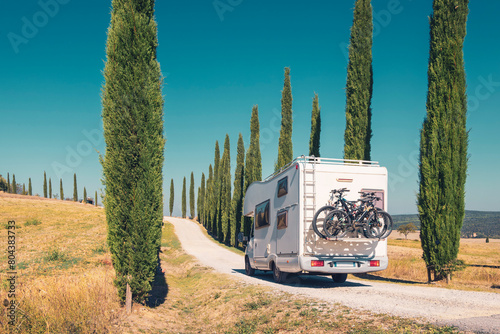 Motor home on the road in Italy, Tuscany- Travel, road trip, adventure concept
