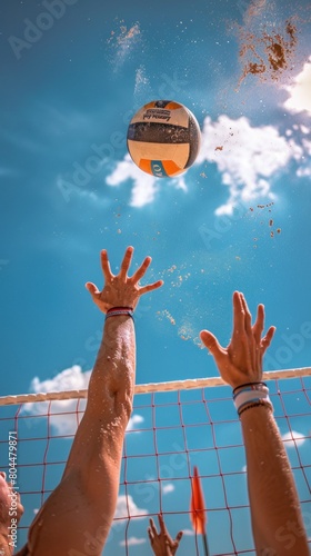 Close-up of hands spiking a volleyball, capturing the tension and athleticism of a beach volleyball game