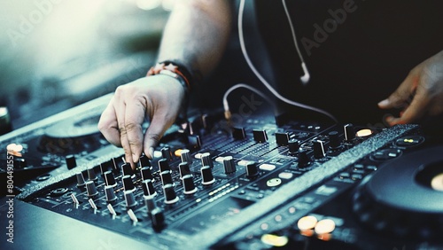 Dynamic DJ Set: Closeup of Unrecognizable DJ Mixing Tracks with CD Players and 4-Channel Mixer at Dance Party (4K image)