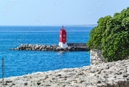 krk, croatia, 1 may 2024, lighthouse in the harbour