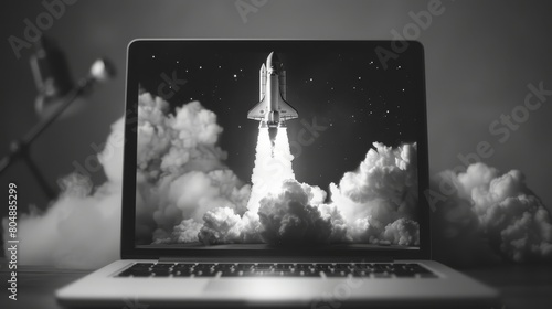 Laptop screen displaying a liftoff, a metaphor for project initiation and career advancement, captured in a moment of motivational growth