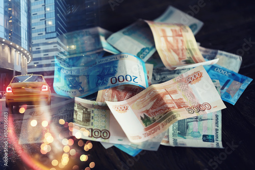 Russian money. Different denomination of bills. Finance concept. Double exposure city.