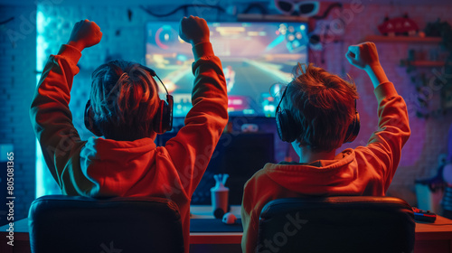 Lifes a game so level up. Shot of a young man cheering while playing computer games. 