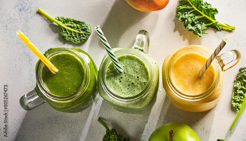 Three tasty detox drinks in glass mason jar. Apple, spinach, kale cocktail. Delicious green beverage