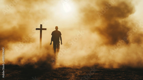 Silhouette of a man in the desert with a cross in the smoke and dust under light the sun, religion concept. 