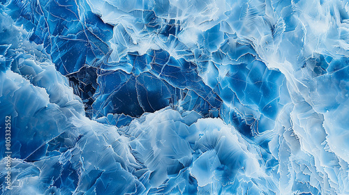Icy blue marble with crystalline patterns, reminiscent of frozen glaciers.