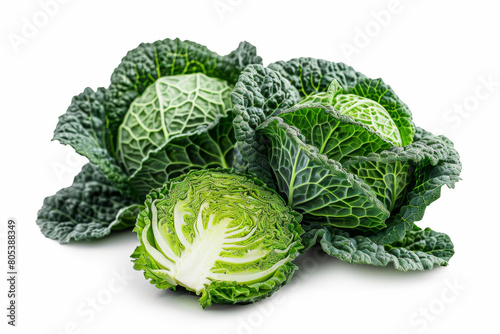 Savoy cabbage fresh green head and one half isolated on white background