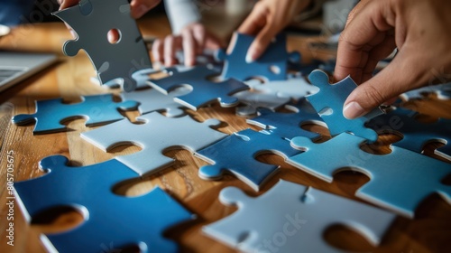 Business Team Assembling Puzzle Pieces to Achieve Vision and Goals