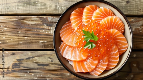 Japanese mix seafood sashimi don. Fresh salmon sashimi don. Raw salmon roe and wasabi. Japanese food on restaurant table. Isolate on wood background top down view