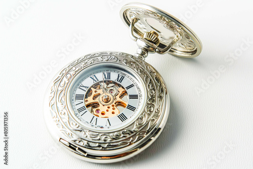 A classic pocket watch with a silver case and Roman numerals on the face, lying open on a clean white background. 