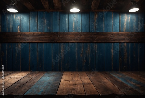 room with wooden floor. Old dark boards wall and table with bright empty space. Vintage wooden background and showroom spotlights. dark