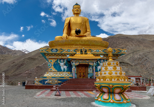 Colorful golden Buddha statue at the Stok Buddhist Monastery in northern India