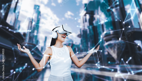 Female stand wear white VR headset and white sleeveless connect metaverse, future technology create cyberspace community. She look around and gesticulate enjoy fantasy building in meta. Hallucination.