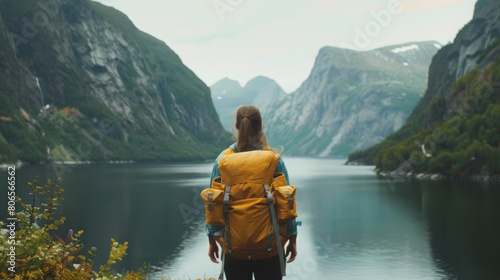 Adventurer Overlooking a Majestic Mountain Lake