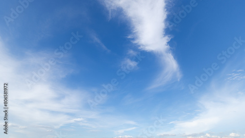 clear blue sky background,clouds with background, Blue sky background with tiny clouds. White fluffy clouds in the blue sky. Captivating stock photo featuring the mesmerizing beauty of the sky and cl