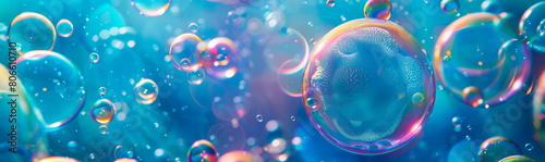 blue background with detergent foam bubbles floating and popping, surrounded by colorful, swirling soap suds.