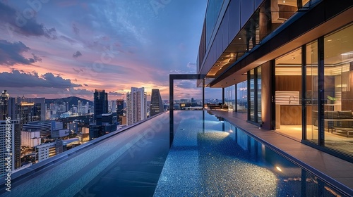 contemporary rooftop pool with panoramic sky views overlooking city skyline, framed by towering buildings and a clear blue sky, with a white sign adding a touch of urbanity