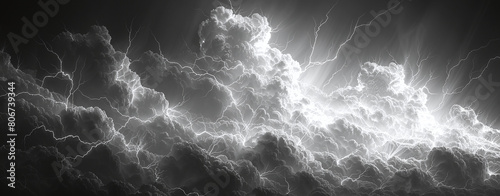 Dramatic black and white image of intense lightning bolts striking through dense clouds, showcasing the power of a thunderstorm.