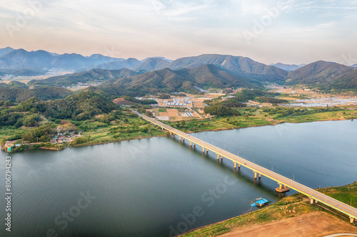 aero drone view. Green Barley Field Scenery of Nakdonggang River in Korea.