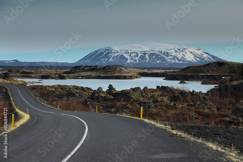 Icelandic natural enviroment landscape, hills and snow covered mountains around lake Myvatn region