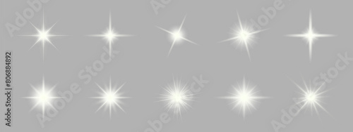 Set of sparkling stars on transparent background. Glow effect. Christmas concept. Festive lights. PNG image