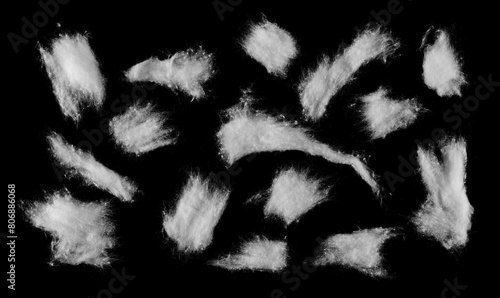 Set absorbent cotton wool pads, swabs, wadding isolated on black, clipping path