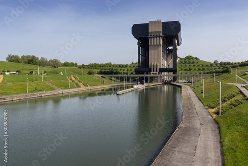 Canal du Centre at Le Rœulx, in Hainaut Province, in Wallonia, Belgium. The Strépy-Thieu boat lift ( L'ascenseur funiculaire de Strépy-Thieu) is visible in the background. Copy space below.