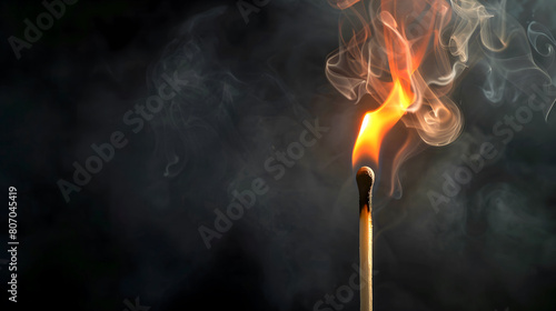 Close-up of a burning match