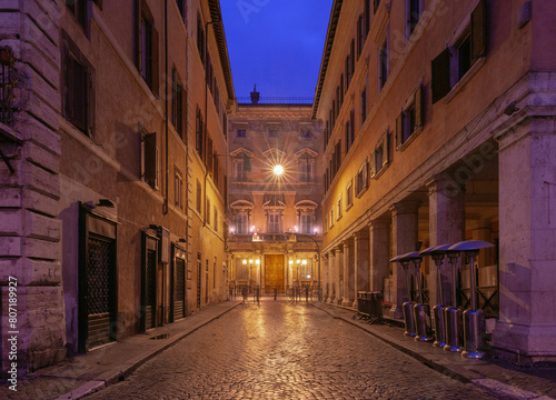 Old traditional street in Rome at dawn.