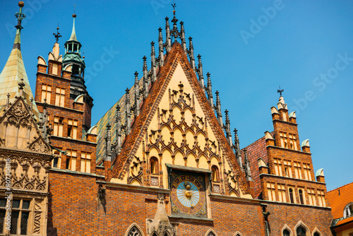 Museum of Bourgeois Art. Clock at the Town Hall Square in Wroclaw, Poland. Polish landmark in the historic center of town