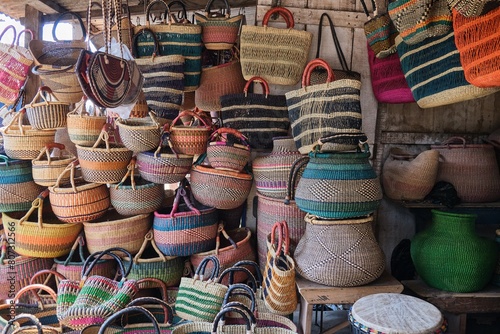 Colourful multicolour and multi pattern hanging woven baskets and handbags, Accra, Ghana