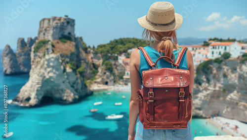 Young woman traveler with backpack background picturesque island corfu, greece. Journey freedom and exploration in idyllic mediterranean sea. Enjoyment nature view, blue ocean, and summer coast.