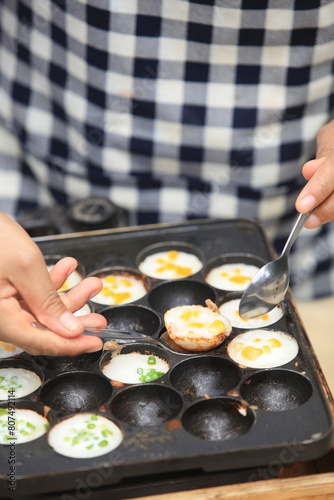 Modern khanom krok often uses corn, taro, pumpkin, and other plants to add flavor, Grilled Coconut-Rice Hotcakes 