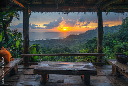 Photograph of an outdoor wooden hut with large windows overlooking the lush green mountains and tropical forest below. Created with Ai