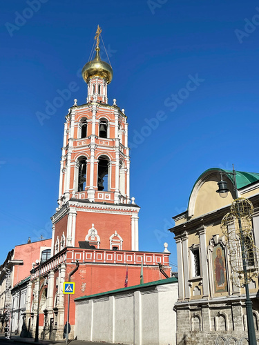 Moscow, Russia, March, 03, 2024. The bell tower of the Vysoko-Petrovsky Monastery and the church of the Tolgskaya Icon of the Mother of God, built in 1744 in Moscow