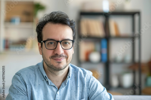 Portrait of Mature Man Looking at Camera at Home with Blurred Background