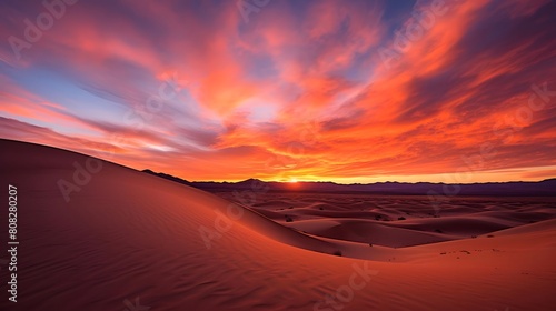 Panoramic view of the sand dunes at sunset in the desert
