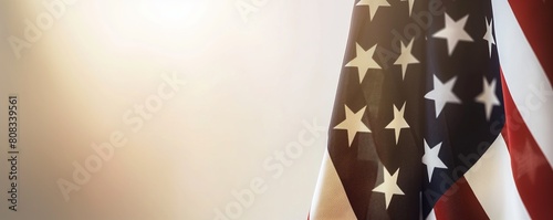Elegant close-up of the american flag with a soft glowing light in the background, symbolizing patriotism and national pride, perfect for memorial day and independence day themes