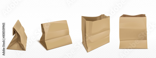 Brown paper bags set isolated on transparent background. Vector realistic illustration of craft package mockup with blank space for branding, grocery shop, supermarket, takeaway food paper packet