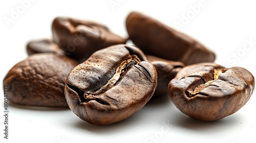 A close-up photograph of a handful of coffee beans.