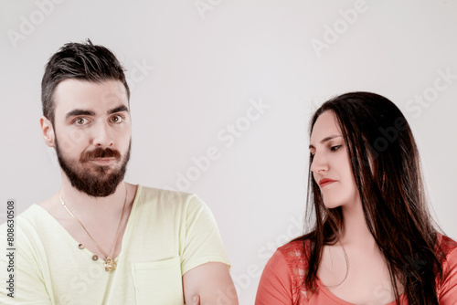 Woman detects sweat smell, man smiles unaware